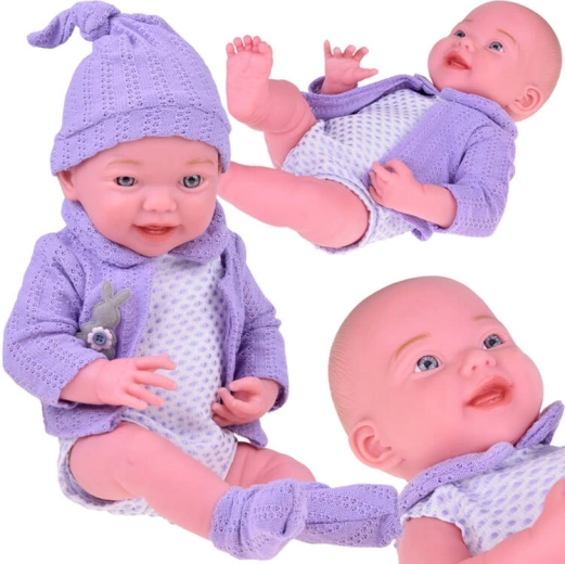Muñeca bebé sonriente 40 cm con jersey morado