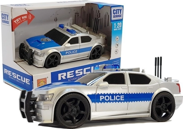 Coche de policía a pilas 1:20 con luces y sonidos, plateado