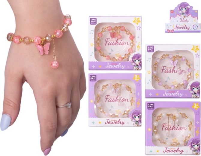 Pulsera infantil con medallón de mariposa en caja de regalo