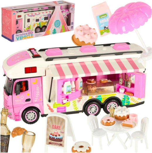 Autocaravana rosa teledirigida con accesorios