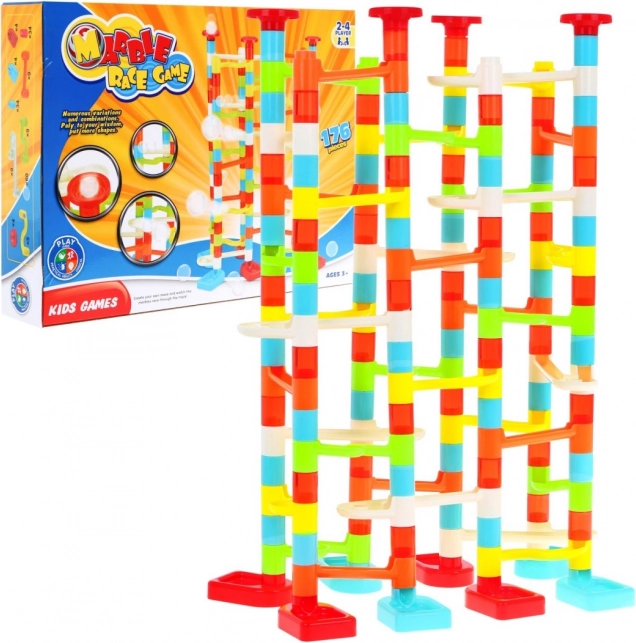 Pista de canicas colorida para niños 3+