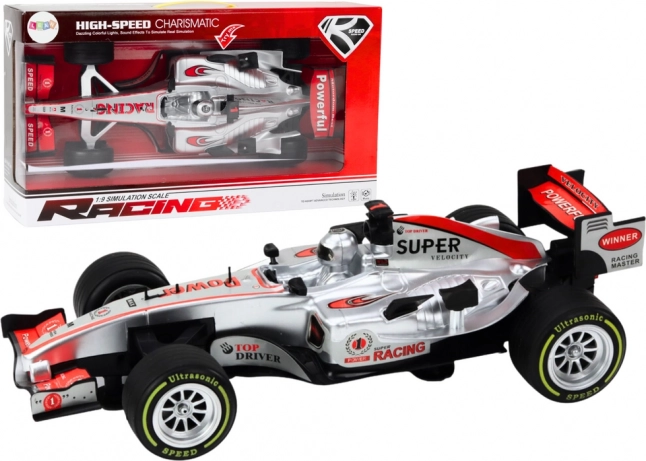 Coche deportivo de carreras con propulsión 1:9, plateado, luces y sonidos