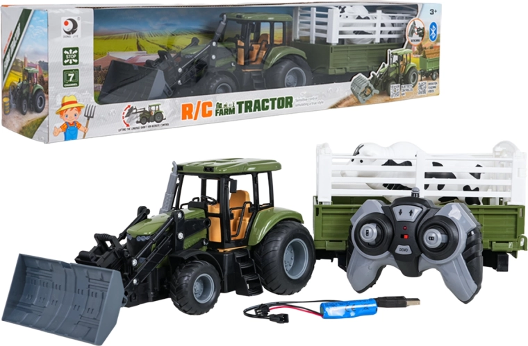 Tractor verde teledirigido con remolque y toro a escala 1:20