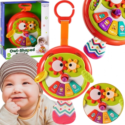 Woopie juguete interactivo búho con pianito y cola crujiente