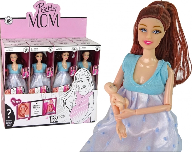 Muñeca embarazada con vestido azul y bebé
