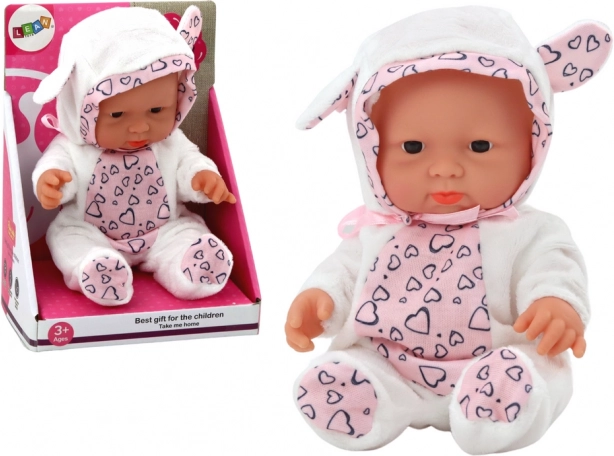 Muñeca bebé pequeña con ropa blanca con capucha y orejitas