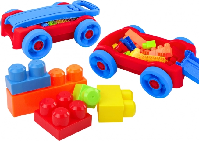 Set infantil de bloques en carrito con ruedas azul‑rojo