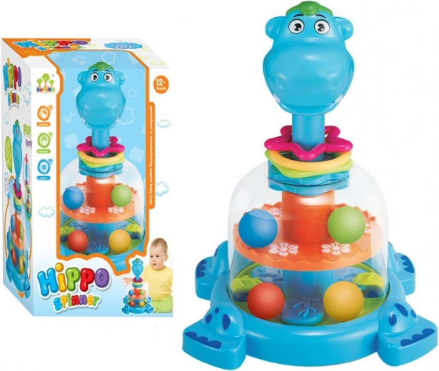 Peonza con bolitas guisante para bebés azul