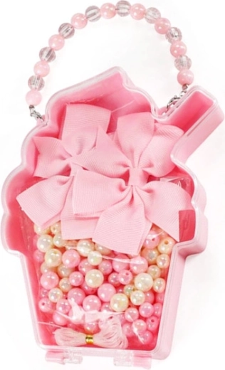 Cuentas con lazos decorativos – set para hacer joyas en un bolsito con forma de cupcake