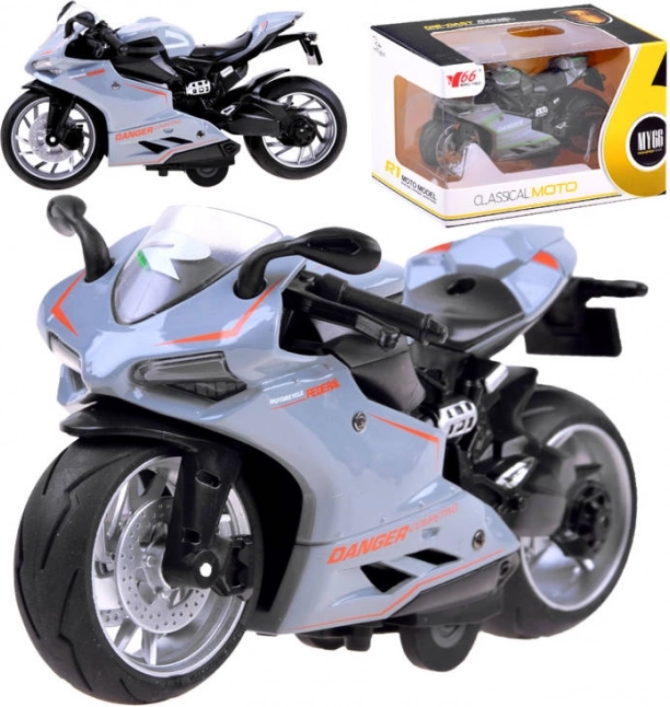 Modelo metálico de motocicleta con mecanismo de resorte