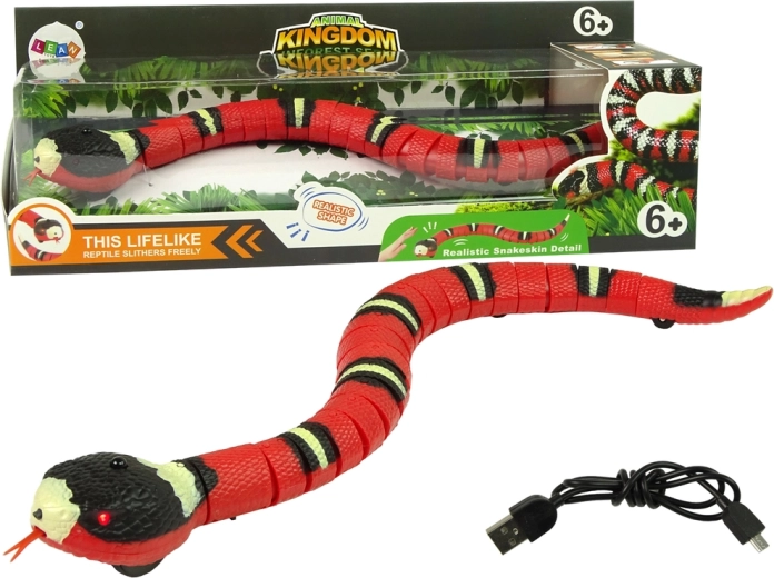 Serpiente interactiva controlada por tacto roja con rayas negras