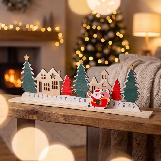 Calendario de Adviento con pueblo navideño y San Nicolás