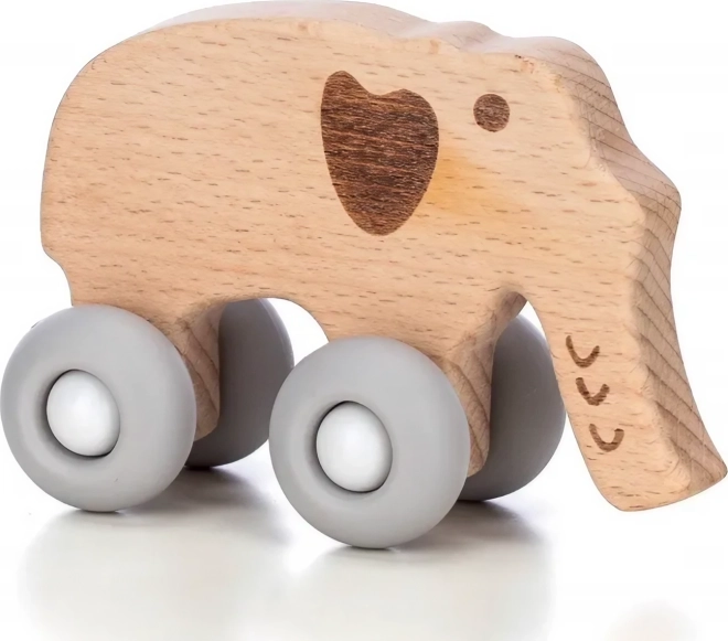Elefante de madera con ruedas para niños
