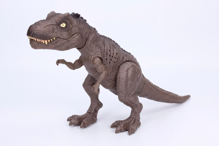 Dinosaurio que echa humo con efectos luminosos y sonoros de 34 cm