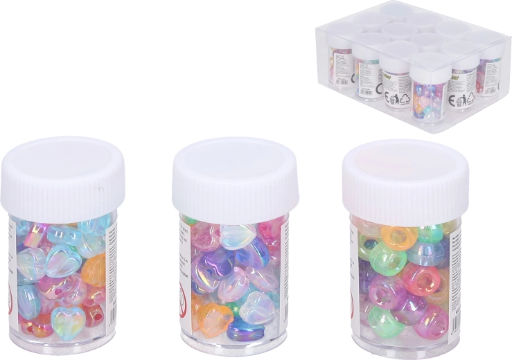 Cuentas de plástico de colores en tubo