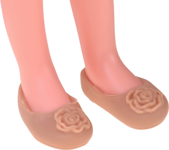 Larga melena rubia y delicados detalles