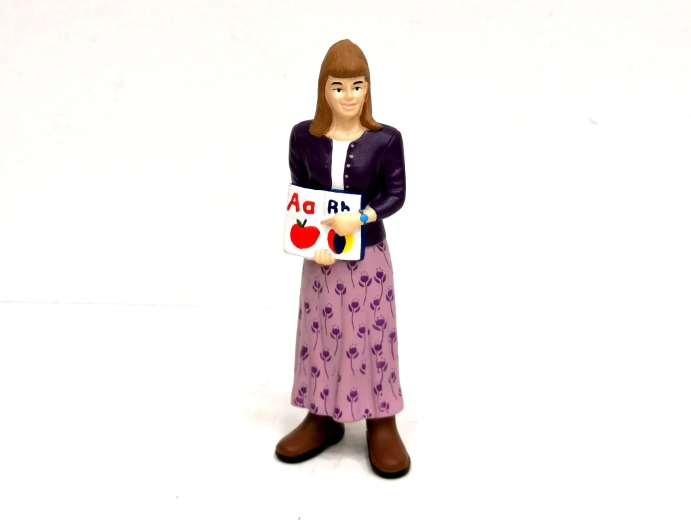 Figura de profesora 13,2 cm - 1 pieza
