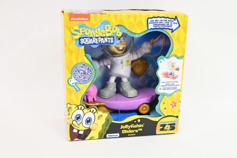Figura de SpongeBob SquarePants Sandy en monopatín Jellyfishin’ Gliders