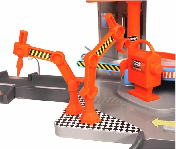 Taller con brazos robóticos y plataforma elevadora