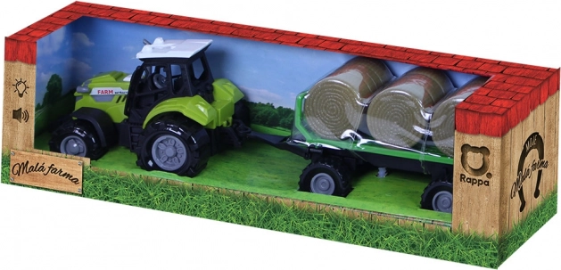 Tractor con sonido y luz con remolque y fardos de paja