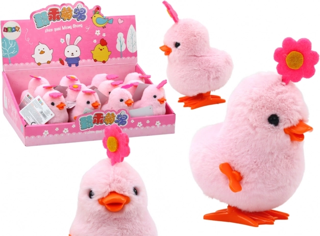 Pollito rosa saltarín de cuerda