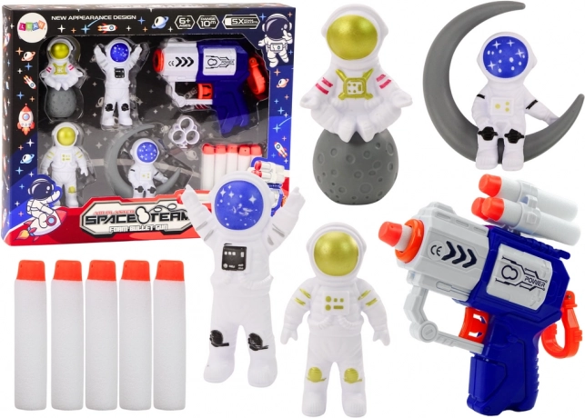 Set cósmico – pistola de dardos blandos con figuras de astronautas