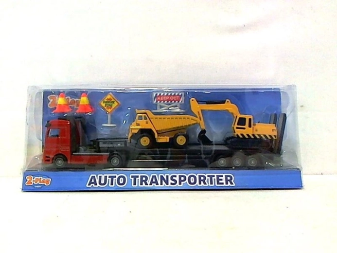 Autotransportador con dos vehículos de construcción