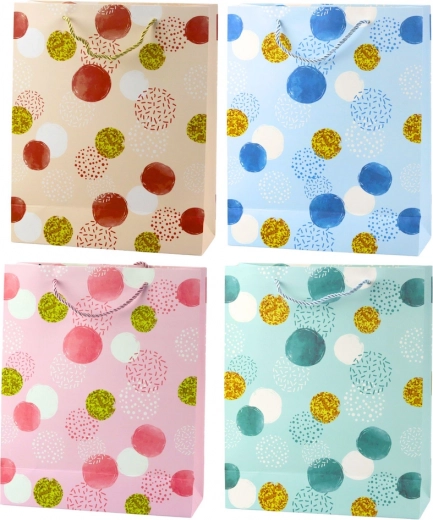 Bolsa de regalo pastel con lunares dorados