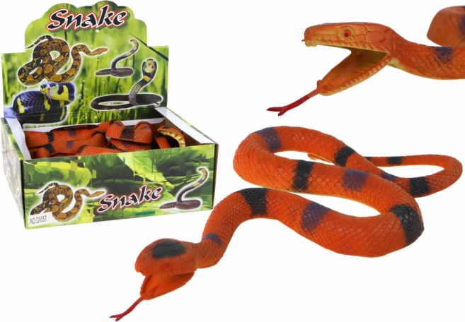 Serpiente de goma marrón con manchas negro-grisáceas