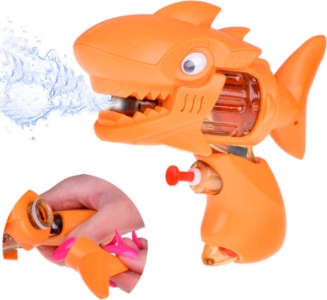 Pistola de agua de bolsillo tiburón naranja