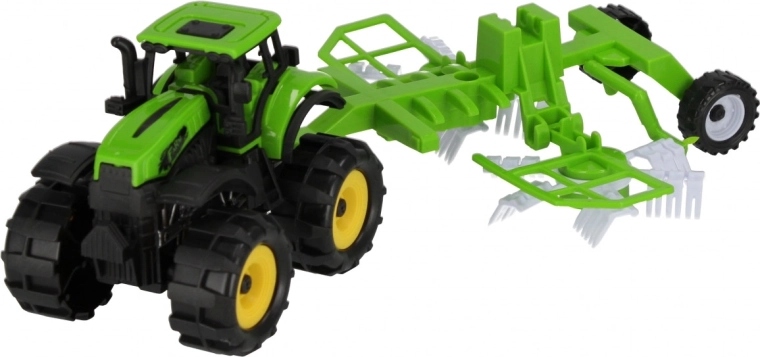Tractor con herramienta agrícola acoplada