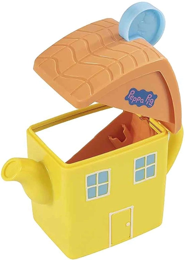 Tetera con forma de casita que emite sonidos