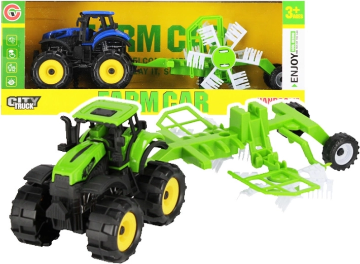 Tractor agrícola con rastrillo pull-back