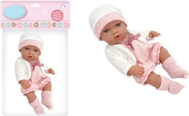 Muñeca bebé con ropa rosa y blanca
