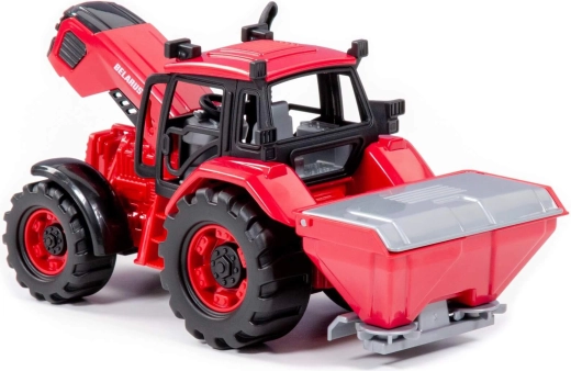 Tractor Belarus con remolque para abono