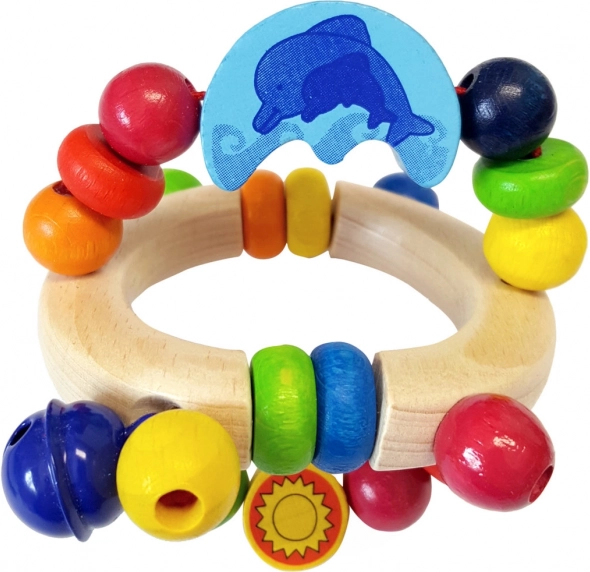 Sonajero de madera con delfín