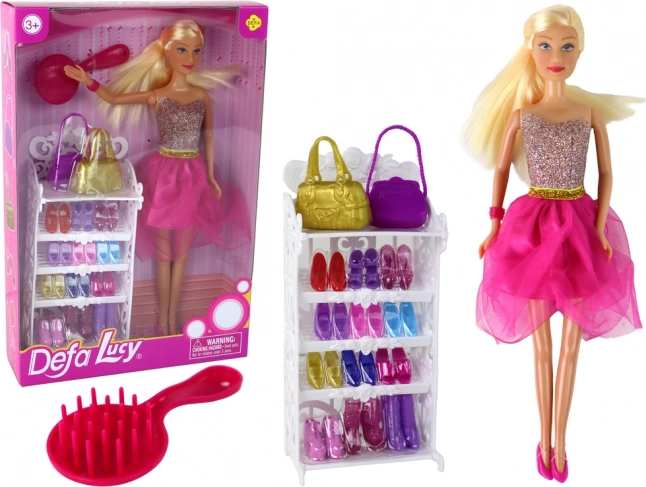 Muñeca Lucy con vestido rosa brillante y set de zapatos