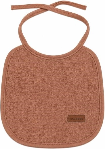 Babero infantil de rizo New Baby con forro de PVC marrón - 1 pieza