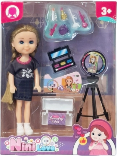 Muñeca con accesorios de cosmética