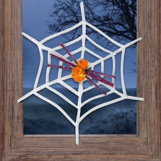 Telaraña blanca de Halloween con araña amarilla