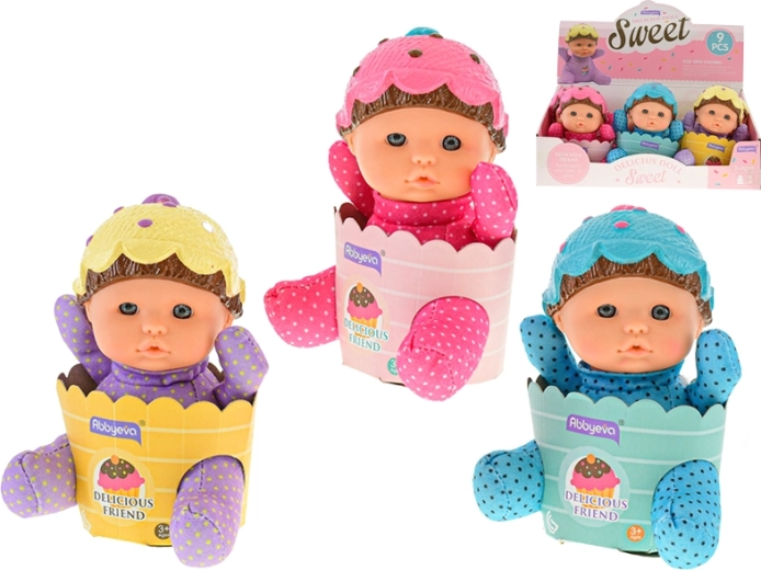 Muñequita bebé en cestita con cuerpecito suave 15 cm, 3 colores