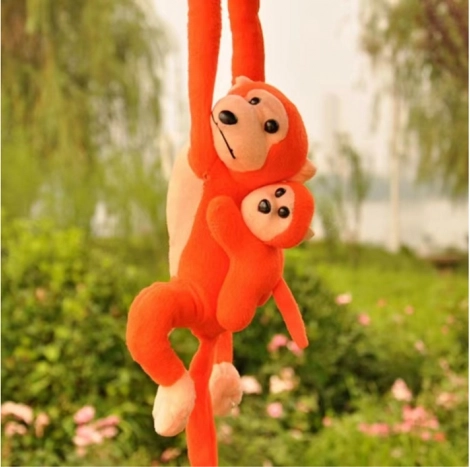 Mono de peluche con cría naranja con sonido