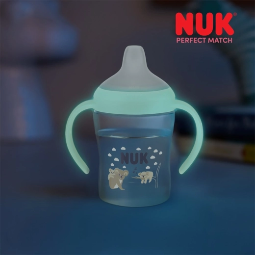 Biberón de aprendizaje NUK Perfect Match que brilla en la oscuridad koala 150 ml