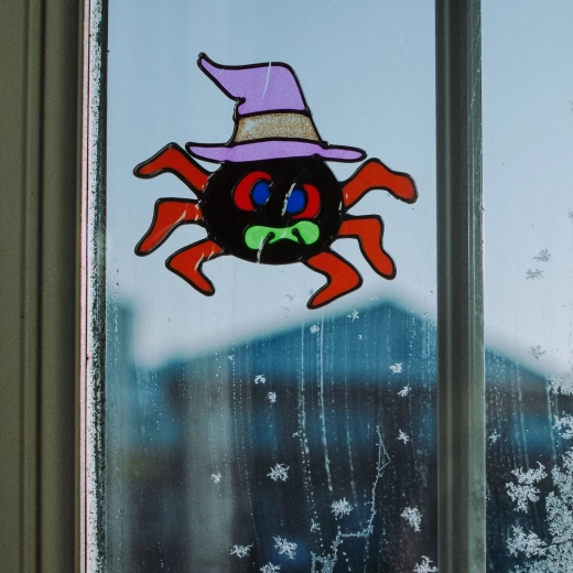 Decoración de Halloween para ventana – araña brillante de colores