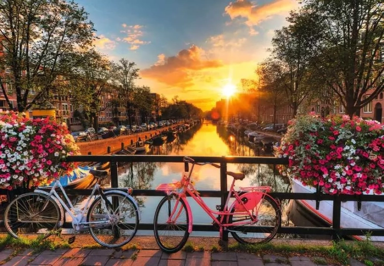 Puzzle Ravensburger Puesta de sol en Ámsterdam XL 200 piezas