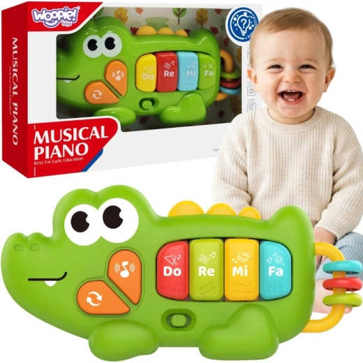 Piano interactivo para bebé Woopie cocodrilo con sonidos y luz 18m+