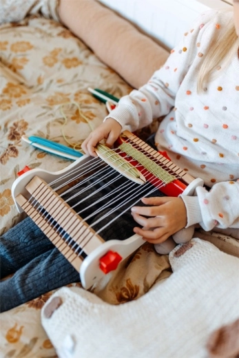 Gran botón tensor para manos infantiles