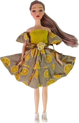 Muñeca con estilo con vestido de cítricos