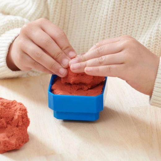 Sistema de moldeado de arena cinética