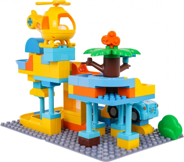 Helicóptero y coche con orificios para pelotas